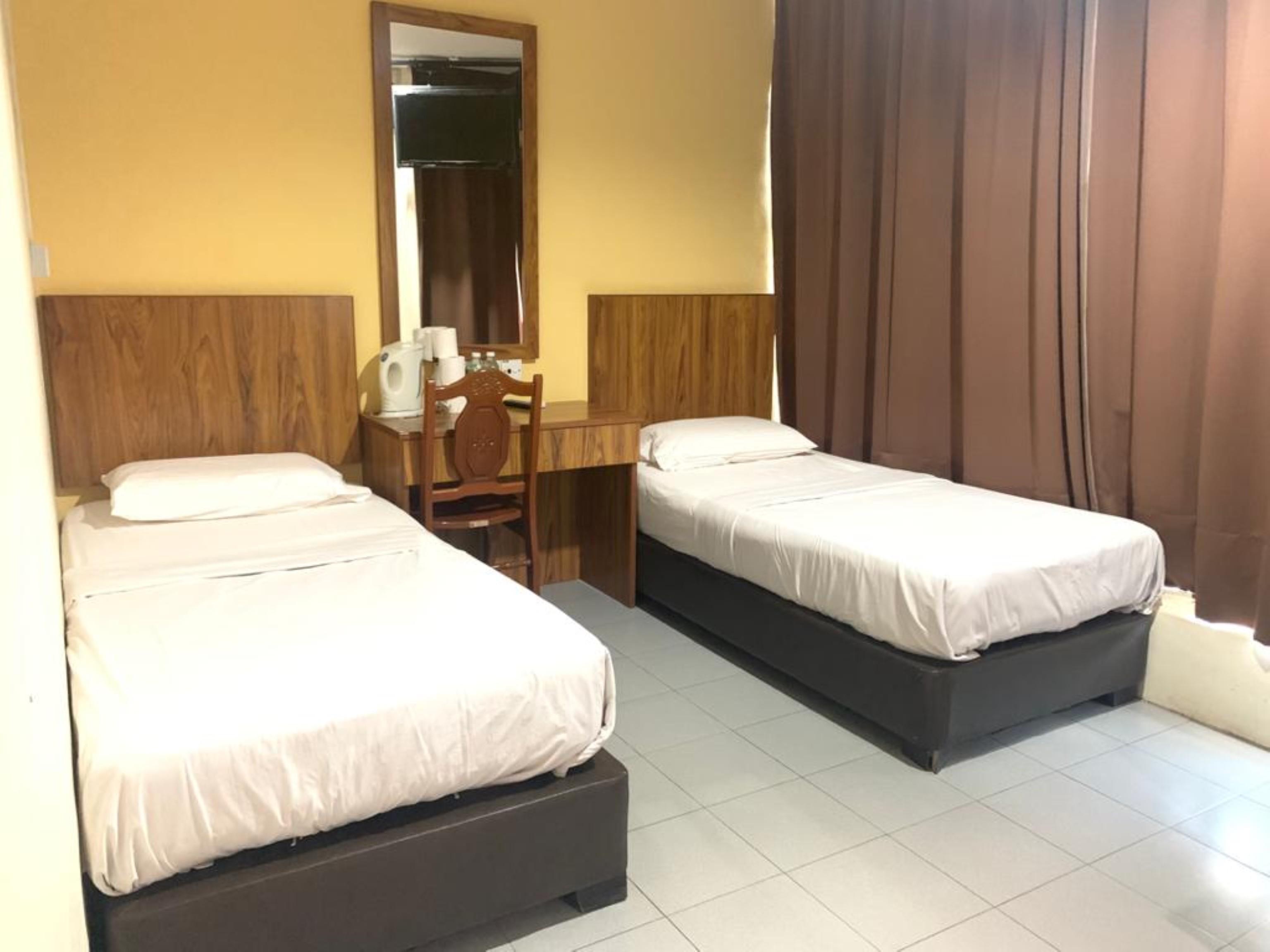 Oyo 89877 Sun Triang Hotel Kampong Kerayong Exteriér fotografie