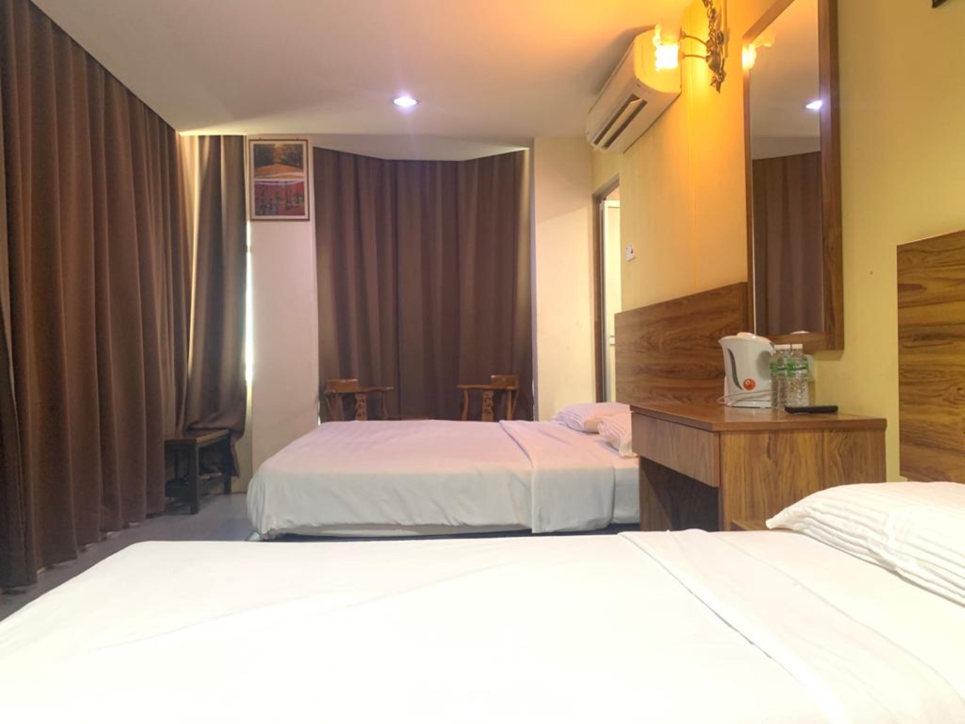 Oyo 89877 Sun Triang Hotel Kampong Kerayong Exteriér fotografie