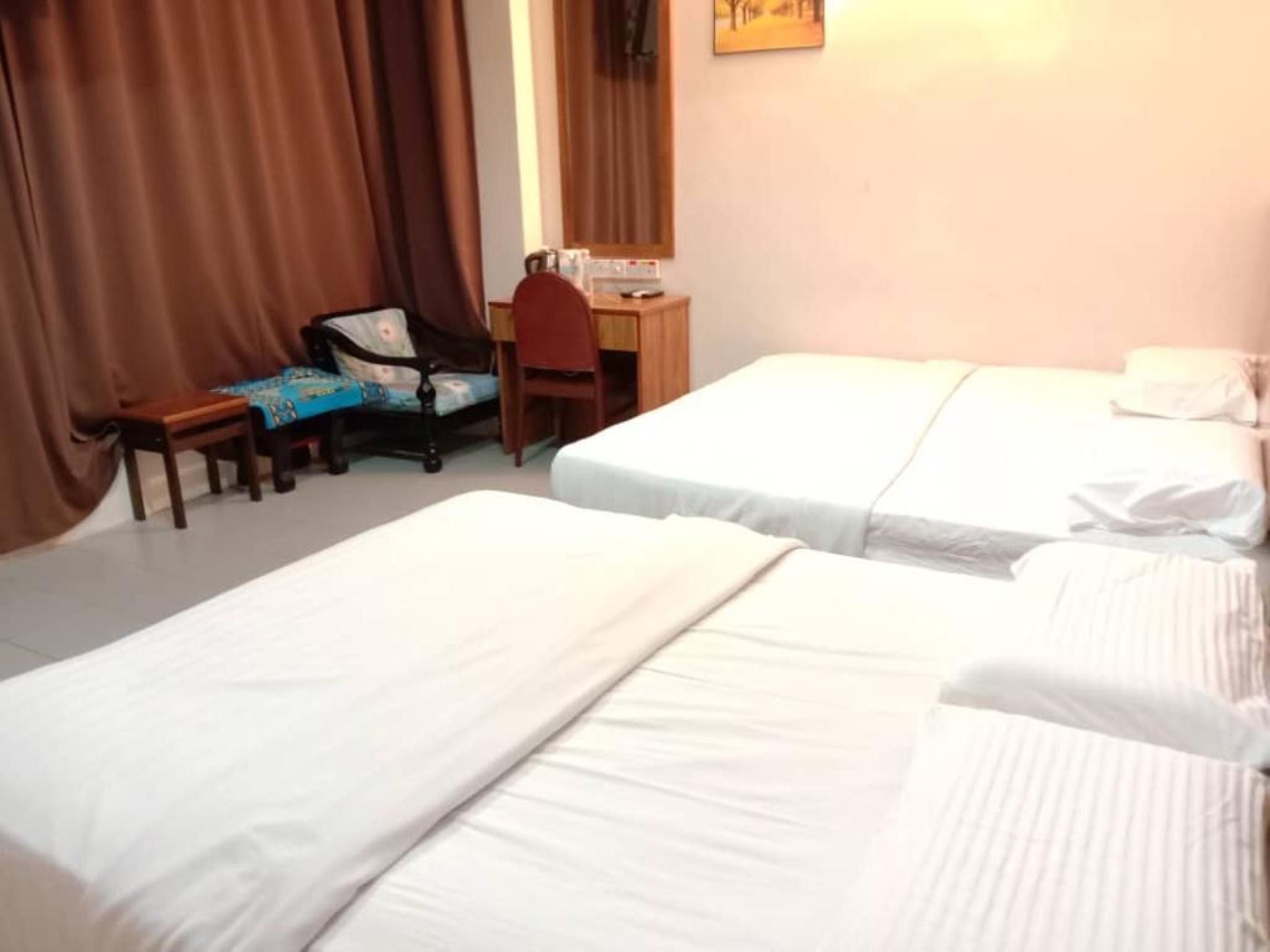 Oyo 89877 Sun Triang Hotel Kampong Kerayong Exteriér fotografie