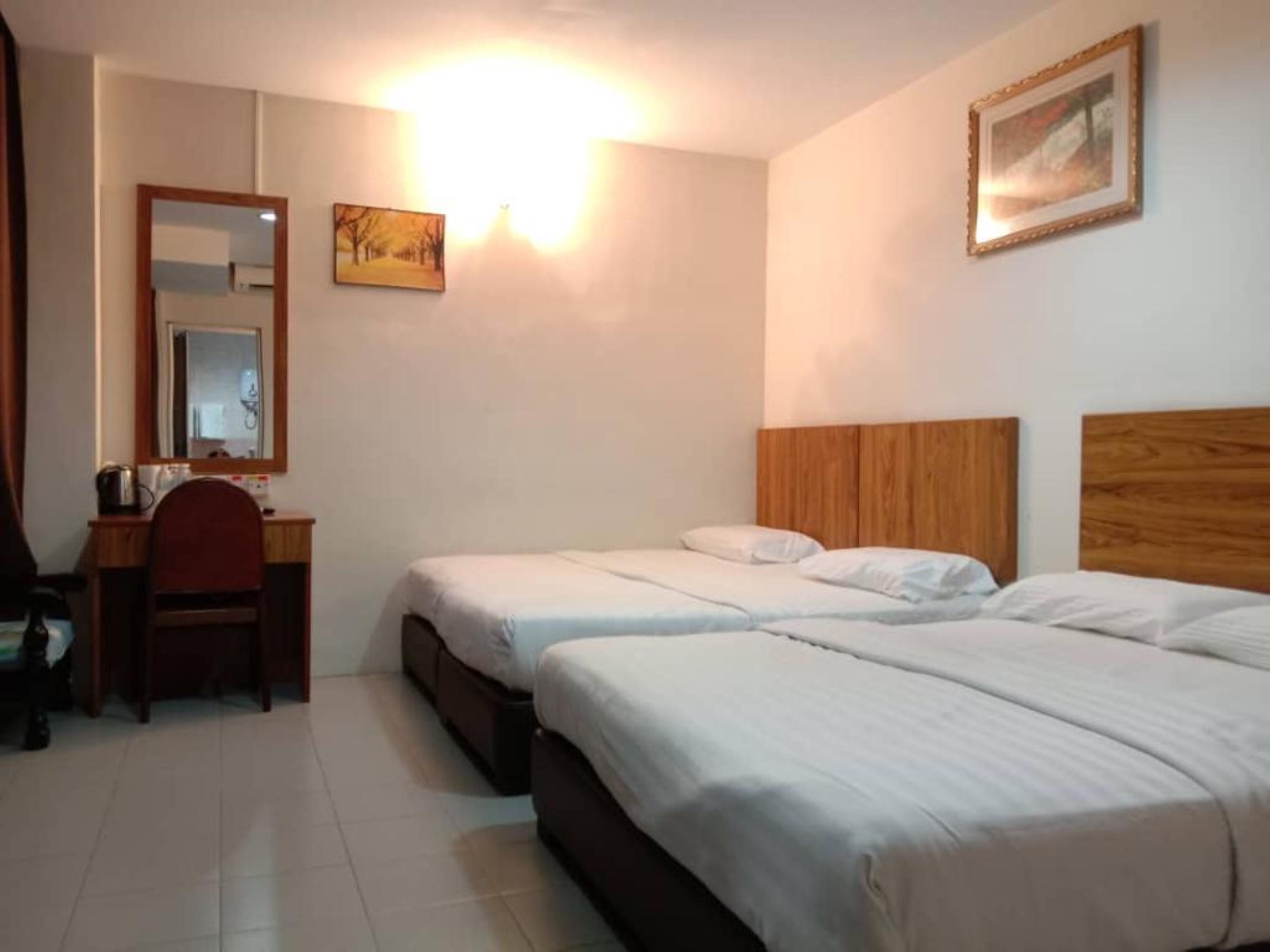 Oyo 89877 Sun Triang Hotel Kampong Kerayong Exteriér fotografie