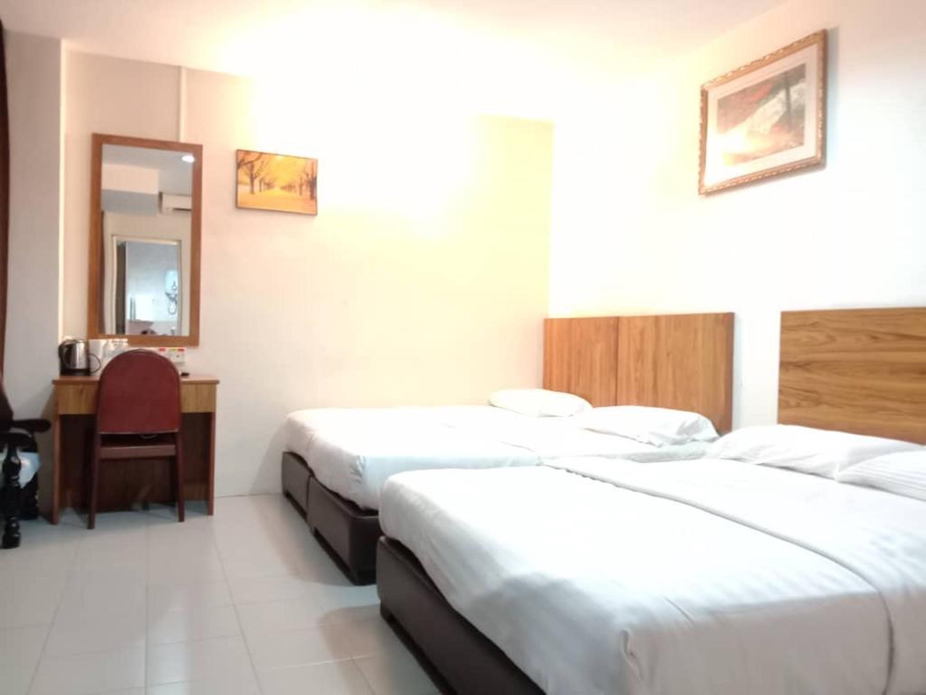 Oyo 89877 Sun Triang Hotel Kampong Kerayong Exteriér fotografie